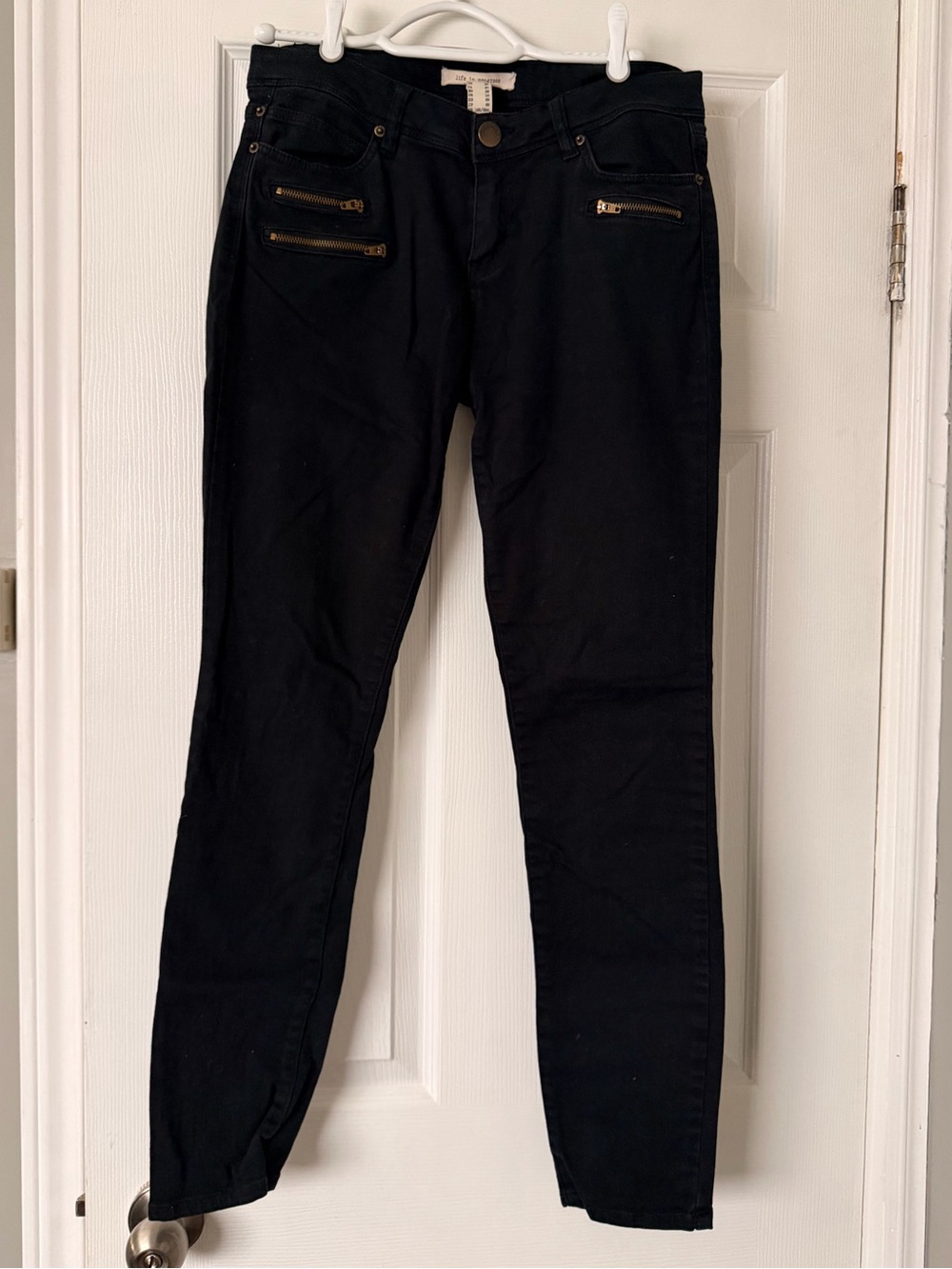 Black Skinny Jeans with Gold Zipper Detail